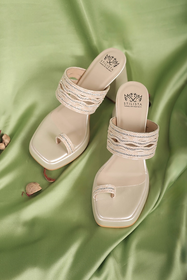 Off-White Synthetic Leather Embellished Block Heels by STILISTA at Pernia's Pop Up Shop