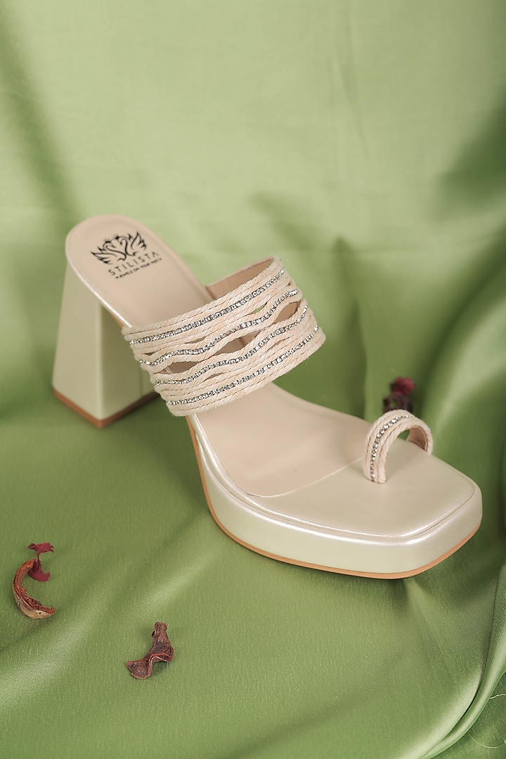 Off-White Synthetic Leather Embellished Block Heels by STILISTA at Pernia's Pop Up Shop