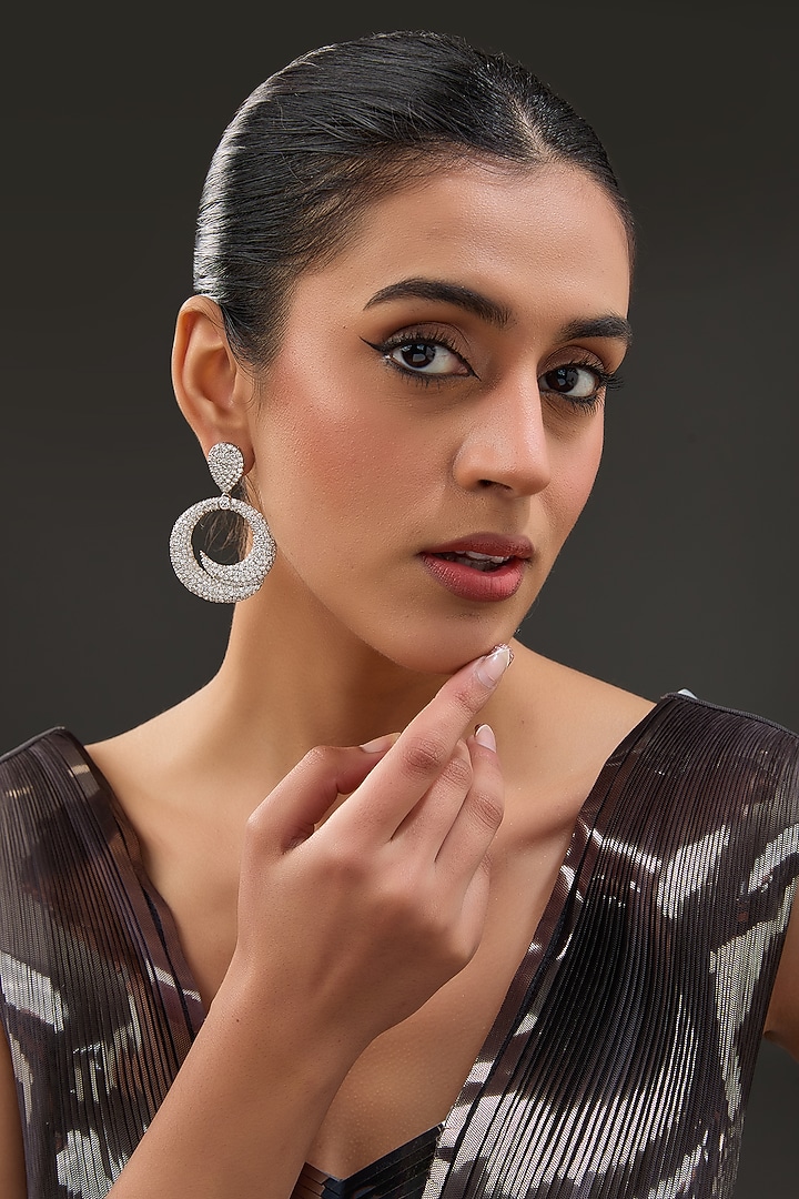 White Finish Zircon Dangler Earrings In Sterling Silver by STELLA CREATIONS at Pernia's Pop Up Shop