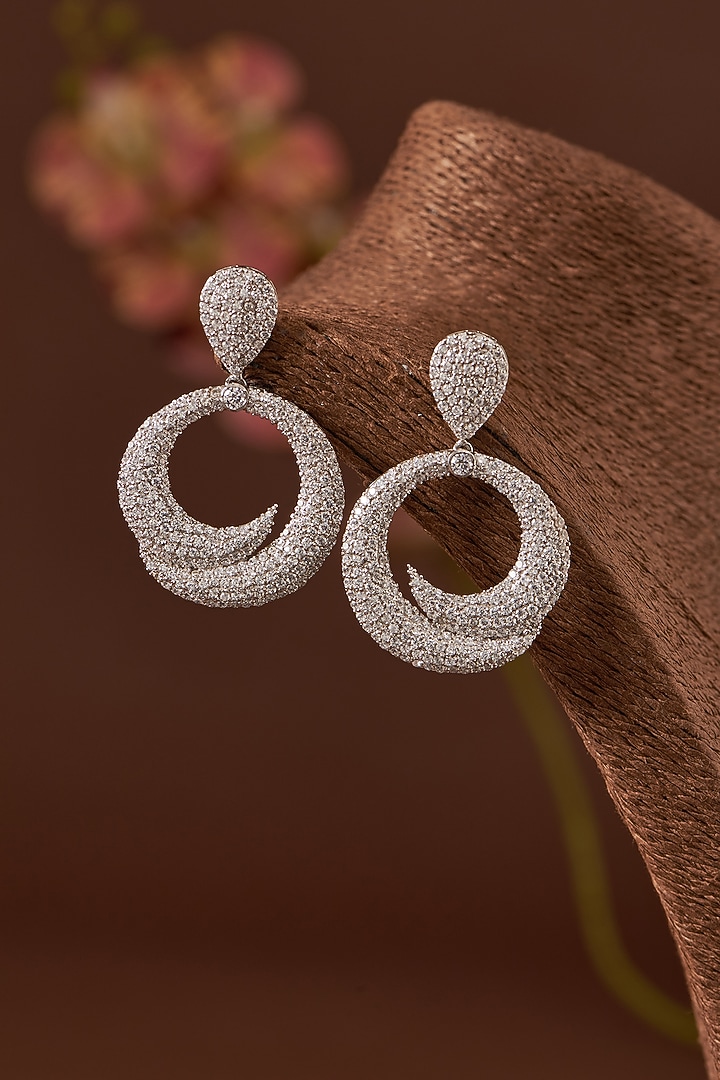 White Finish Zircon Dangler Earrings In Sterling Silver by STELLA CREATIONS at Pernia's Pop Up Shop