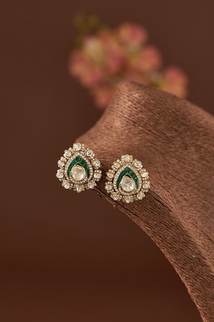 Gold Finish Moissanite Polki & Synthetic Emerald Stone Stud Earrings In Sterling Silver by STELLA CREATIONS at Pernia's Pop Up Shop
