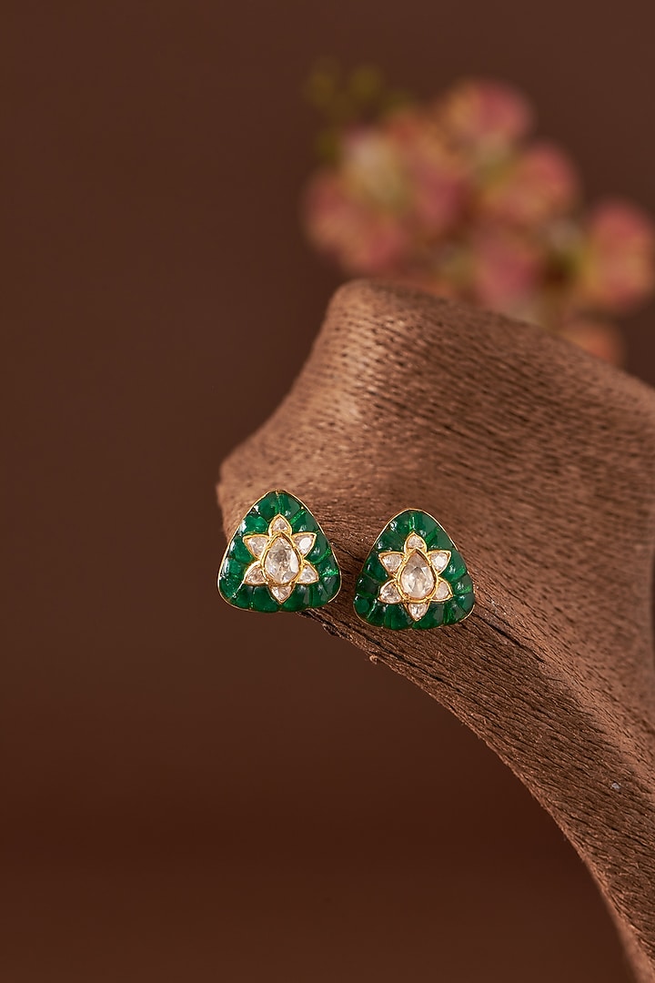 Gold Finish Moissanite Polki & Synthetic Emerald Stone Stud Earrings In Sterling Silver by STELLA CREATIONS at Pernia's Pop Up Shop