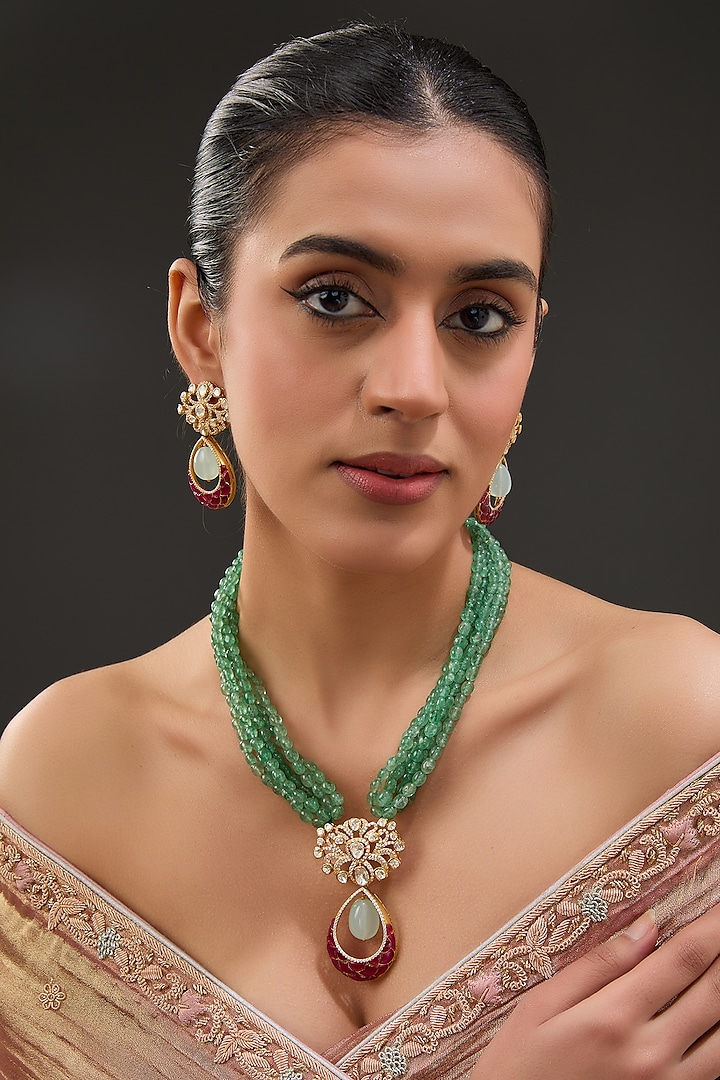 Gold Finish Moissanite Polki & Emerald Necklace Set In Sterling Silver by STELLA CREATIONS at Pernia's Pop Up Shop
