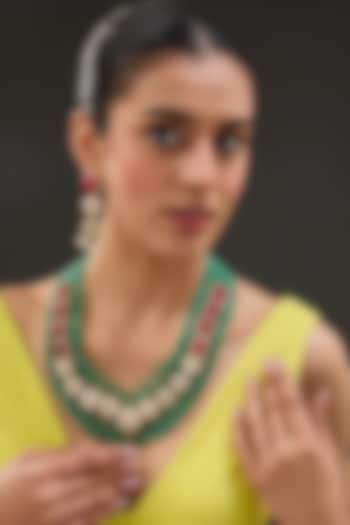 Gold Finish Ruby & Emerald Necklace Set In Sterling Silver by STELLA CREATIONS at Pernia's Pop Up Shop