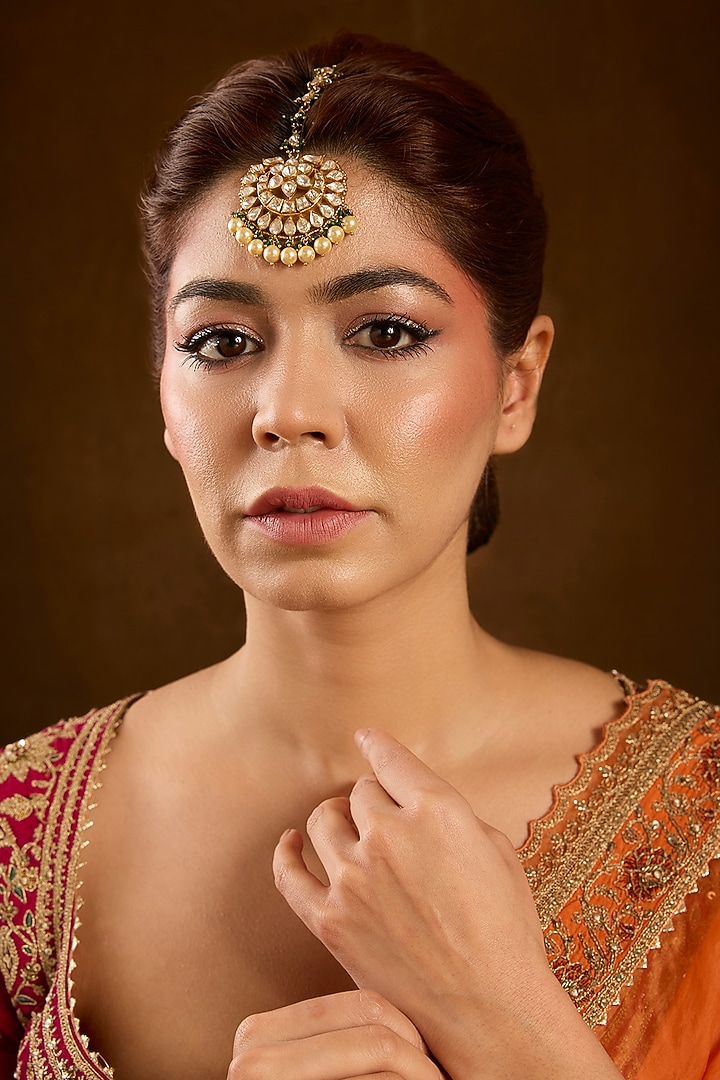 Yellow Gold Finish Emerald & Moissanite Polki Maangtikka In Sterling Silver by STELLA CREATIONS at Pernia's Pop Up Shop