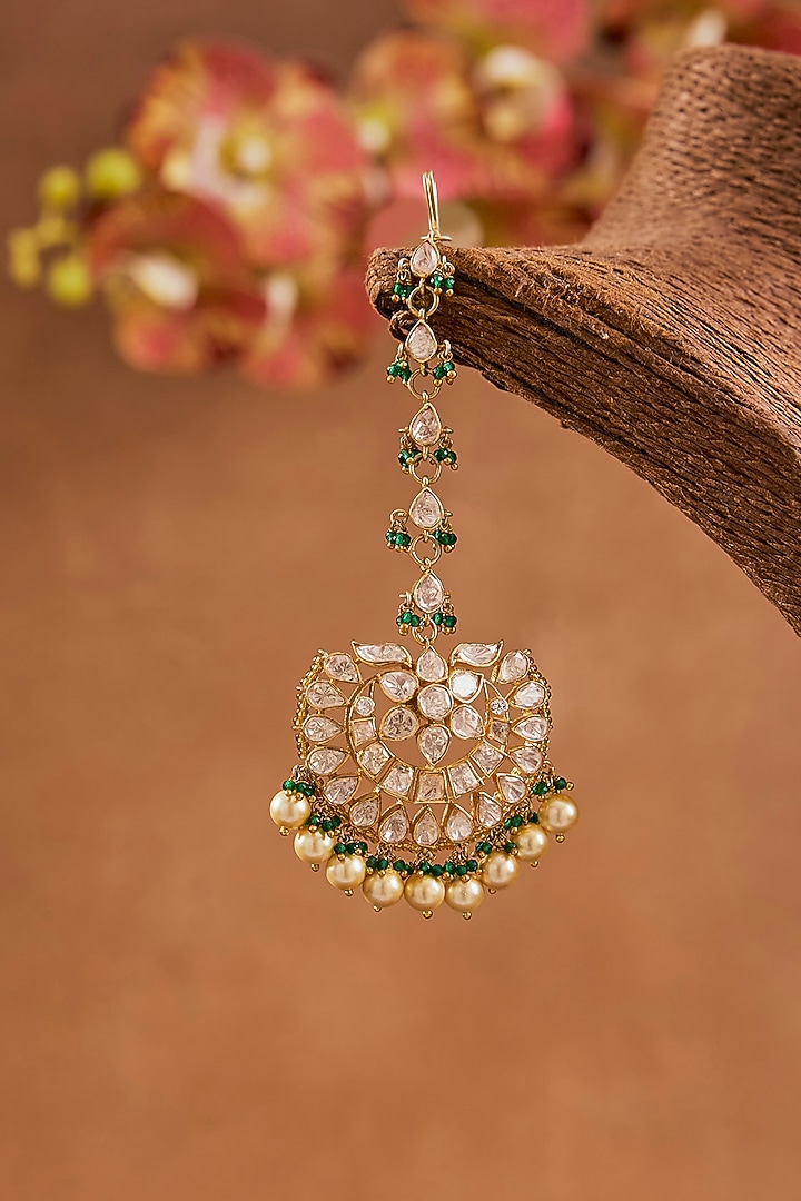 Yellow Gold Finish Emerald & Moissanite Polki Maangtikka In Sterling Silver by STELLA CREATIONS at Pernia's Pop Up Shop