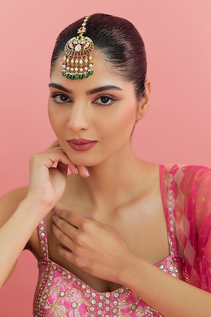 Yellow Gold Finish Moissanite Polki & Emerald Maangtikka In Sterling Silver by STELLA CREATIONS at Pernia's Pop Up Shop