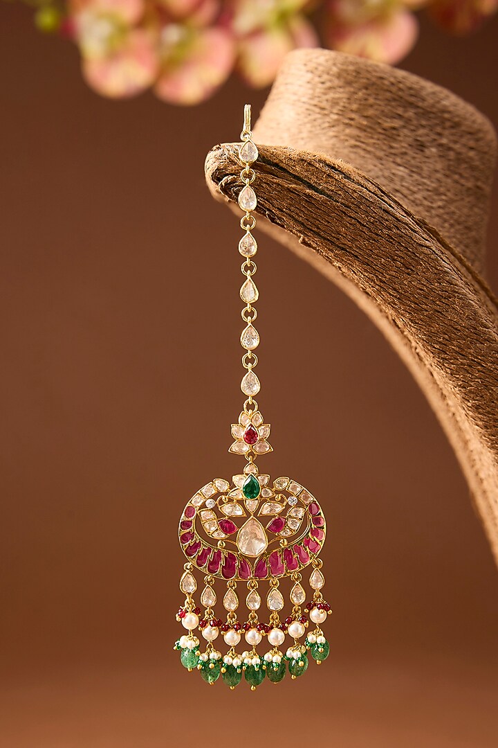 Yellow Gold Finish Moissanite Polki & Emerald Maangtikka In Sterling Silver by STELLA CREATIONS at Pernia's Pop Up Shop