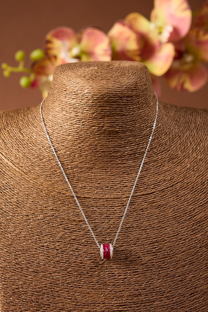 White Gold Finish Swarovski & Ruby Pendant In Sterling Silver by STELLA CREATIONS at Pernia's Pop Up Shop