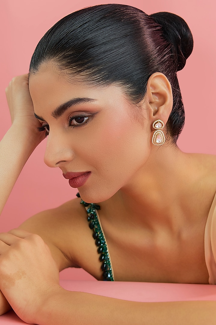 Yellow Gold Finish Eurostar Swarovski & Moissanite Polki Stud Earrings In Sterling Silver by STELLA CREATIONS at Pernia's Pop Up Shop