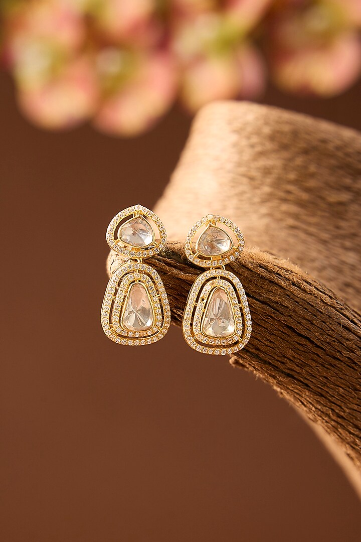 Yellow Gold Finish Eurostar Swarovski & Moissanite Polki Stud Earrings In Sterling Silver by STELLA CREATIONS at Pernia's Pop Up Shop