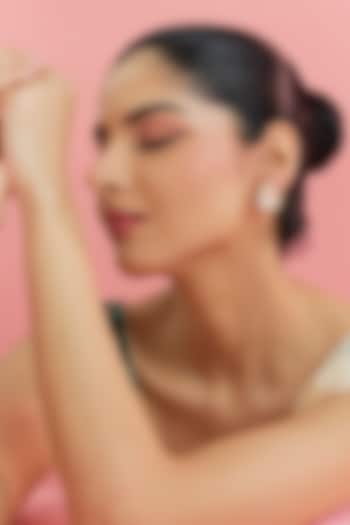 Yellow Gold Finish Eurostar Swarovski & Moissanite Polki Stud Earrings In Sterling Silver by STELLA CREATIONS at Pernia's Pop Up Shop