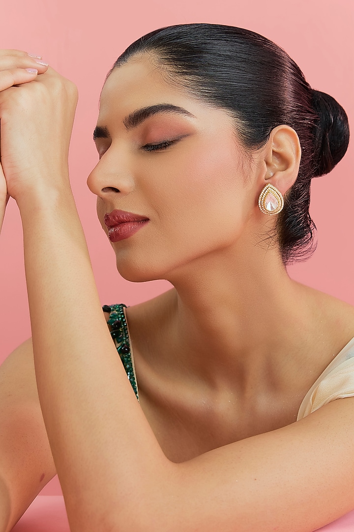 Yellow Gold Finish Eurostar Swarovski & Moissanite Polki Stud Earrings In Sterling Silver by STELLA CREATIONS at Pernia's Pop Up Shop