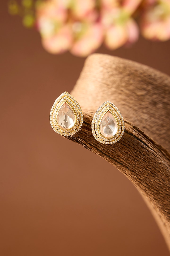 Yellow Gold Finish Eurostar Swarovski & Moissanite Polki Stud Earrings In Sterling Silver by STELLA CREATIONS at Pernia's Pop Up Shop