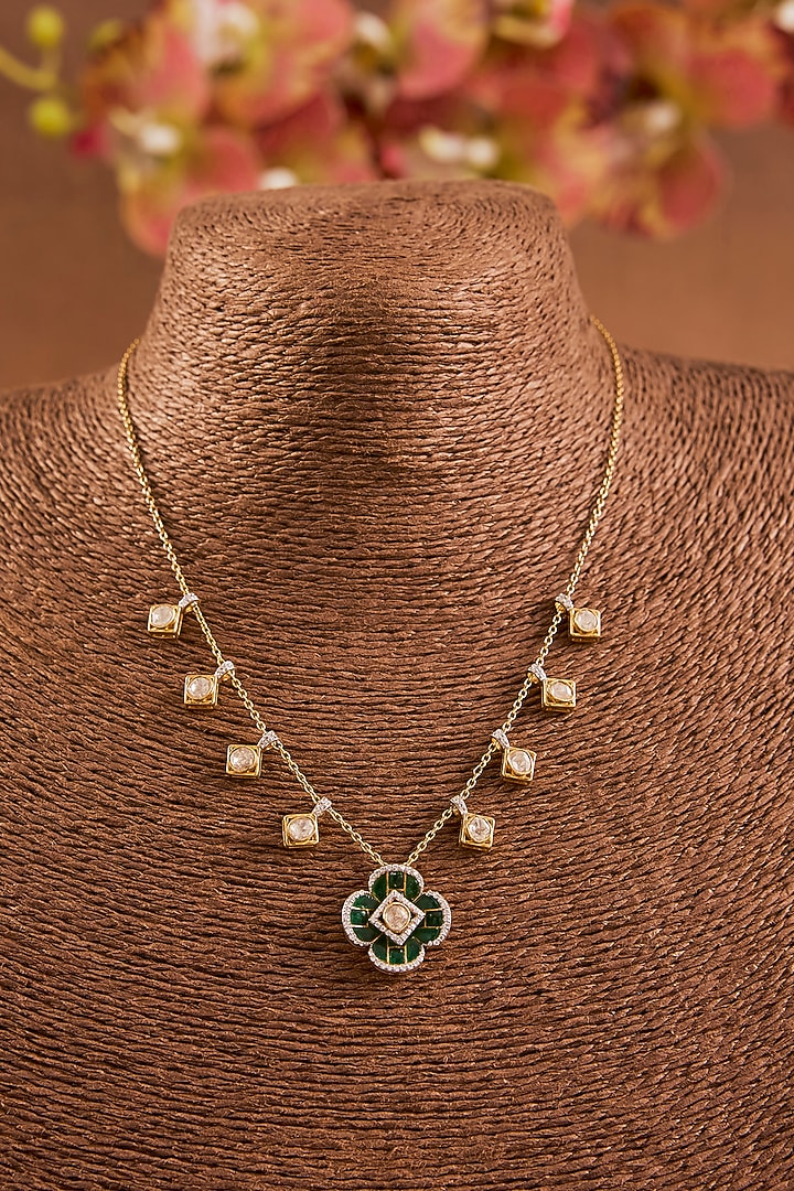 Yellow Gold Finish Eurostar & Emerald Pendant Chain Necklace In Sterling Silver by STELLA CREATIONS at Pernia's Pop Up Shop