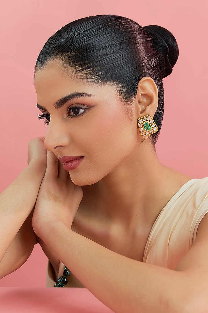 Yellow Gold Finish Moissanite Polki & Emerald Stud Earrings In Sterling Silver by STELLA CREATIONS at Pernia's Pop Up Shop