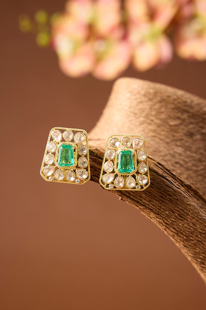 Yellow Gold Finish Moissanite Polki & Emerald Stud Earrings In Sterling Silver by STELLA CREATIONS at Pernia's Pop Up Shop