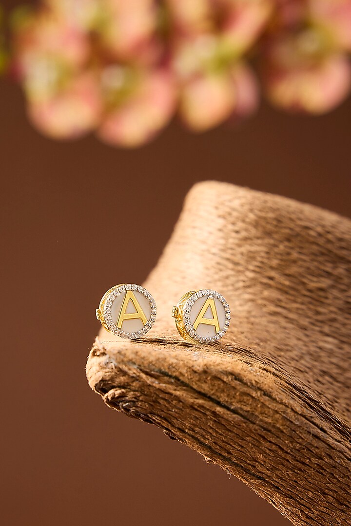 Yellow Gold Finish Eurostar Swarovski & Pearl Initial Button Cuffs (Set Of 2) by STELLA CREATIONS at Pernia's Pop Up Shop