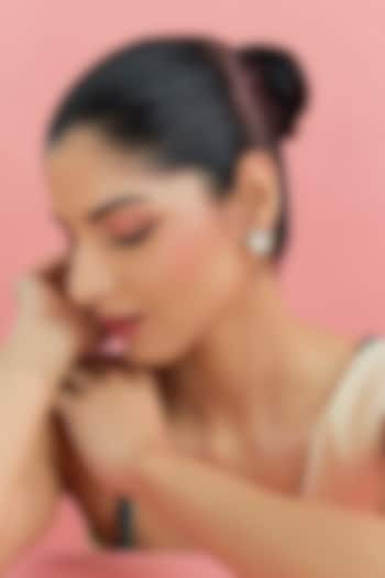 Yellow Gold Finish Eurostar Swarovski & Moissanite Polki Stud Earrings In Sterling Silver by STELLA CREATIONS at Pernia's Pop Up Shop