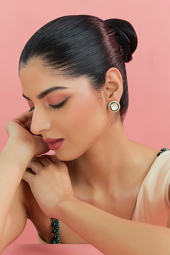 Yellow Gold Finish Eurostar Swarovski & Moissanite Polki Stud Earrings In Sterling Silver by STELLA CREATIONS at Pernia's Pop Up Shop