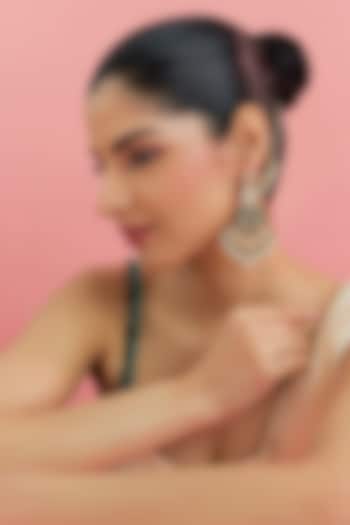 Yellow Gold Finish Eurostar Swarovski & Emerald Dangler Earrings In Sterling Silver by STELLA CREATIONS at Pernia's Pop Up Shop