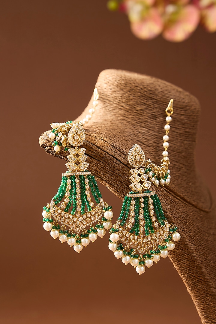 Yellow Gold Finish Eurostar Swarovski & Emerald Dangler Earrings In Sterling Silver by STELLA CREATIONS at Pernia's Pop Up Shop
