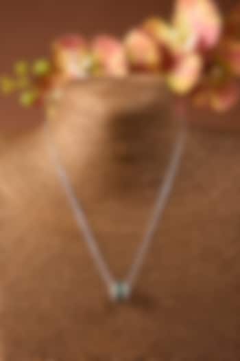 White Gold Finish Emerald & Swarovski Pendant In Sterling Silver by STELLA CREATIONS at Pernia's Pop Up Shop