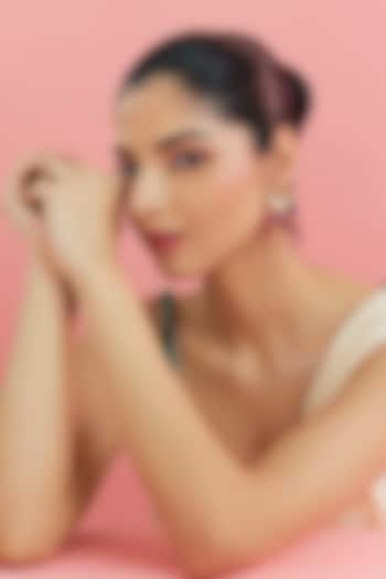 Yellow Gold Finish Moissanite Polki & Ruby Stud Earrings In Sterling Silver by STELLA CREATIONS at Pernia's Pop Up Shop