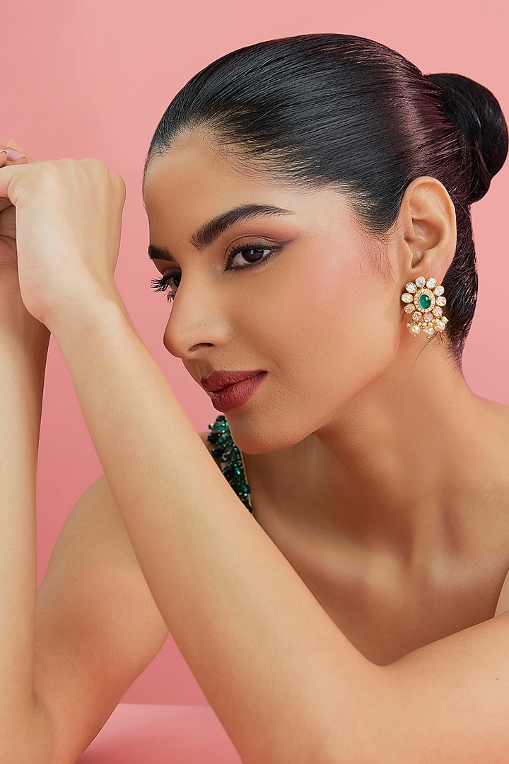 Yellow Gold Finish Moissanite Polki & Emerald Stud Earrings In Sterling Silver by STELLA CREATIONS at Pernia's Pop Up Shop