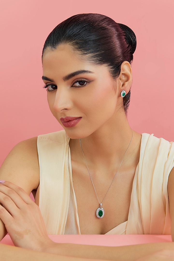 White Gold Finish Swarovski & Emerald Pendant Set In Sterling Silver by STELLA CREATIONS at Pernia's Pop Up Shop