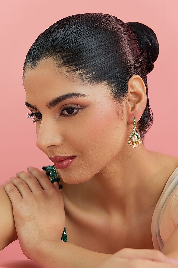 Yellow Gold Finish Moissanite Polki & Emerald Dangler Earrings In Sterling Silver by STELLA CREATIONS at Pernia's Pop Up Shop