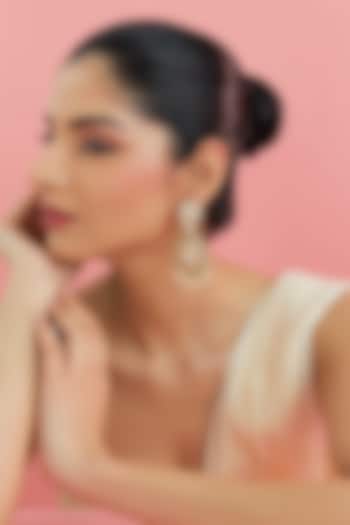 Yellow Gold Finish Moissanite Polki & Emerald Dangler Earrings In Sterling Silver by STELLA CREATIONS at Pernia's Pop Up Shop