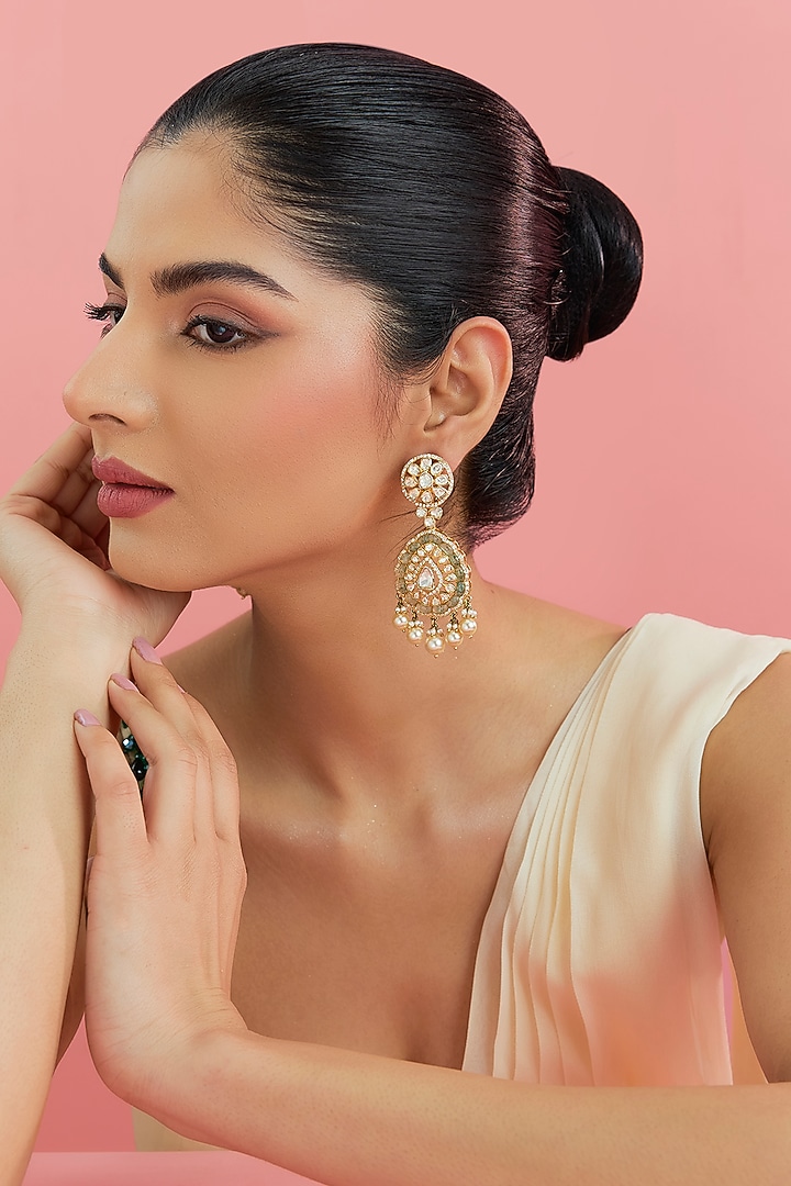 Yellow Gold Finish Moissanite Polki & Emerald Dangler Earrings In Sterling Silver by STELLA CREATIONS at Pernia's Pop Up Shop