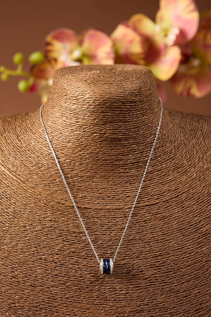 White Gold Finish Swarovski & Sapphire Pendant In Sterling Silver by STELLA CREATIONS at Pernia's Pop Up Shop