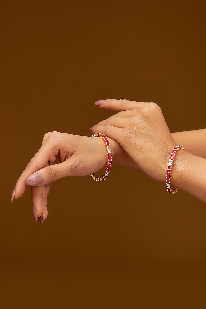 Gold Finish CZ & Synthetic Ruby Stone Bangles In Sterling Silver (Set of 2) by STELLA CREATIONS