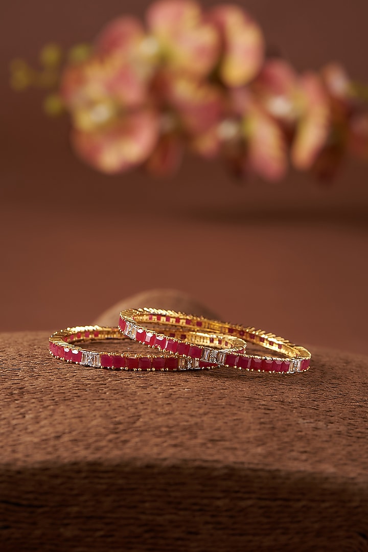 Gold Finish CZ & Synthetic Ruby Stone Bangles In Sterling Silver (Set of 2) by STELLA CREATIONS at Pernia's Pop Up Shop