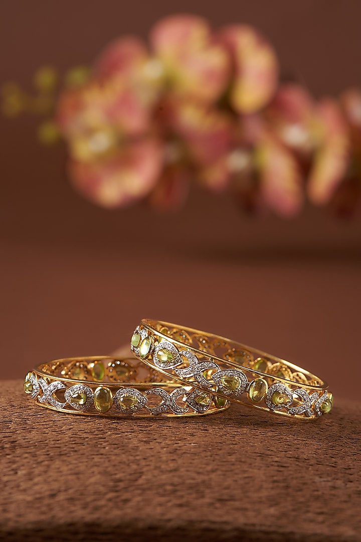 Gold Finish Zircon & Peridot Bangles In Sterling Silver (Set of 2) by STELLA CREATIONS at Pernia's Pop Up Shop