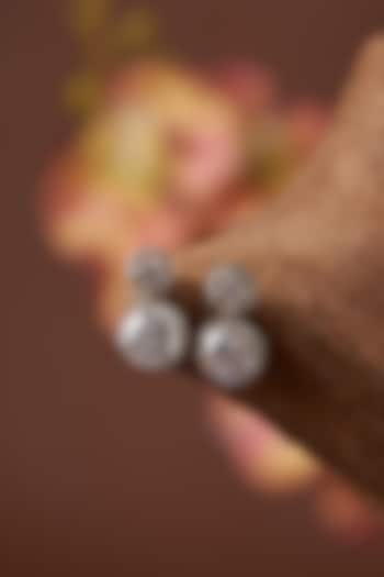 White Finish Zircon Dangler Earrings In Sterling Silver by STELLA CREATIONS