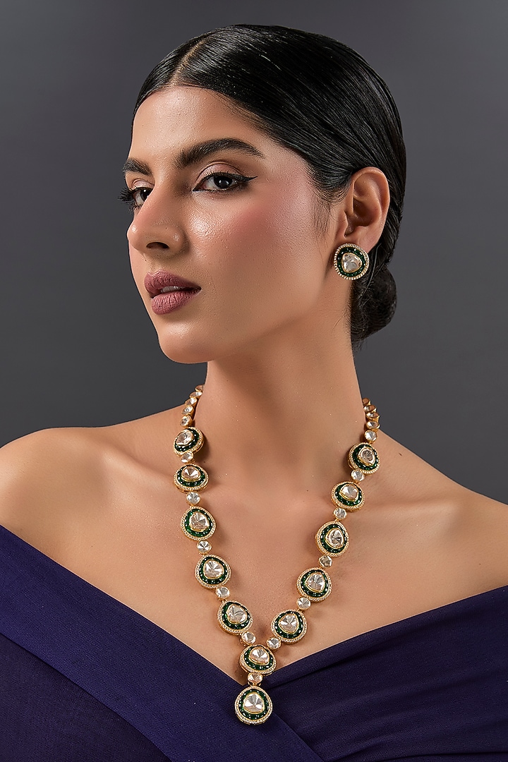Yellow Gold Finish Moissanite Polki & Emerald Long Necklace Set In Sterling Silver by STELLA CREATIONS at Pernia's Pop Up Shop