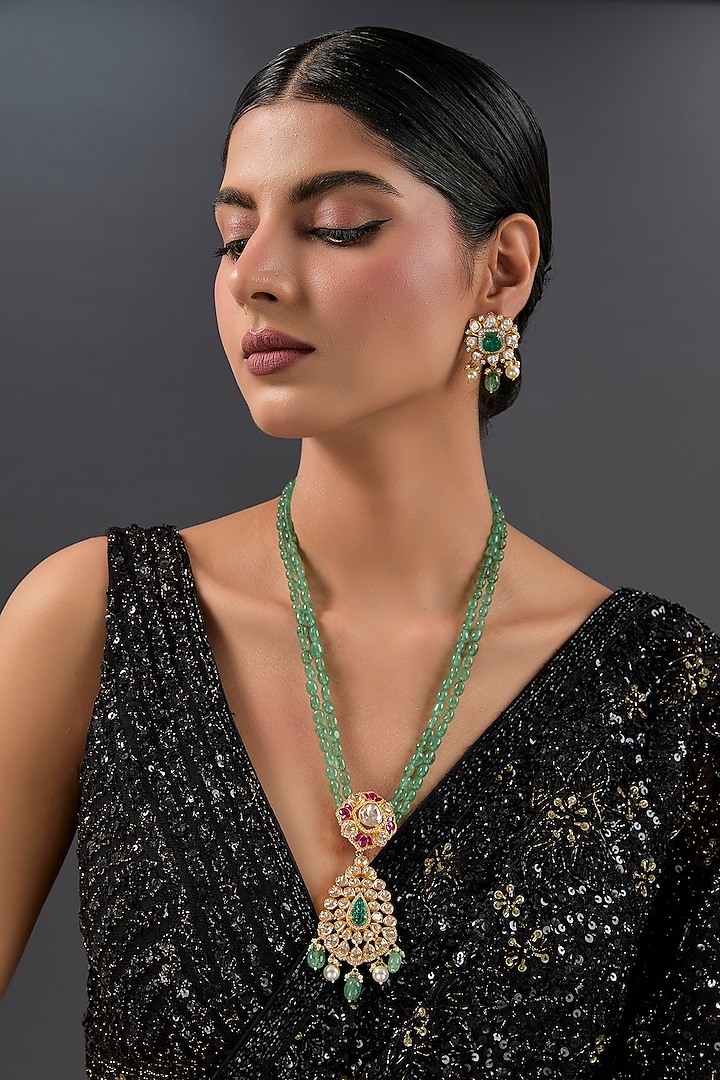 Yellow Gold Finish Moissanite Polki & Emerald Long Pendant Necklace Set In Sterling Silver by STELLA CREATIONS at Pernia's Pop Up Shop