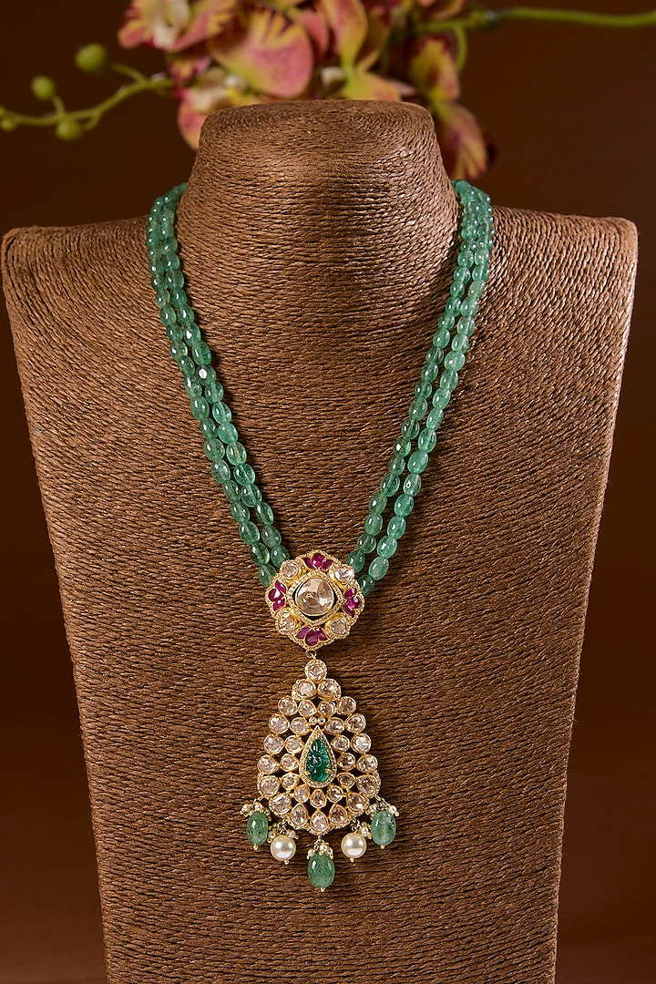 Yellow Gold Finish Moissanite Polki & Emerald Long Pendant Necklace Set In Sterling Silver by STELLA CREATIONS at Pernia's Pop Up Shop