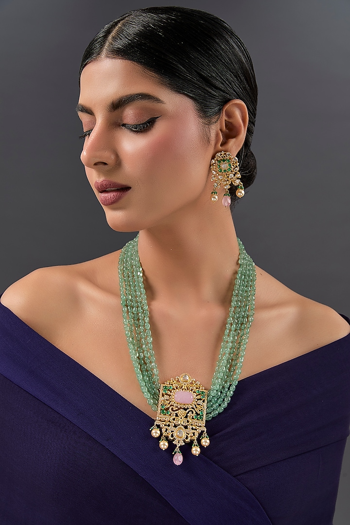 Yellow Gold Finish Moissanite Polki & Emerald Long Necklace Set In Sterling Silver by STELLA CREATIONS at Pernia's Pop Up Shop