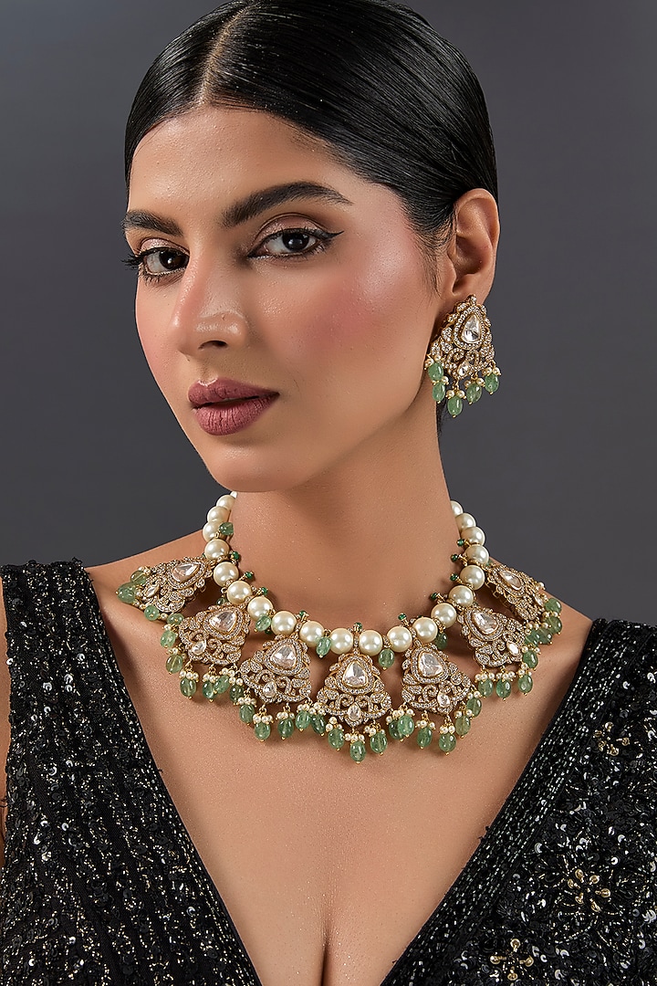 Gold Finish Kundan Polki & Emerald Stone Necklace Set In Sterling Silver by STELLA CREATIONS at Pernia's Pop Up Shop