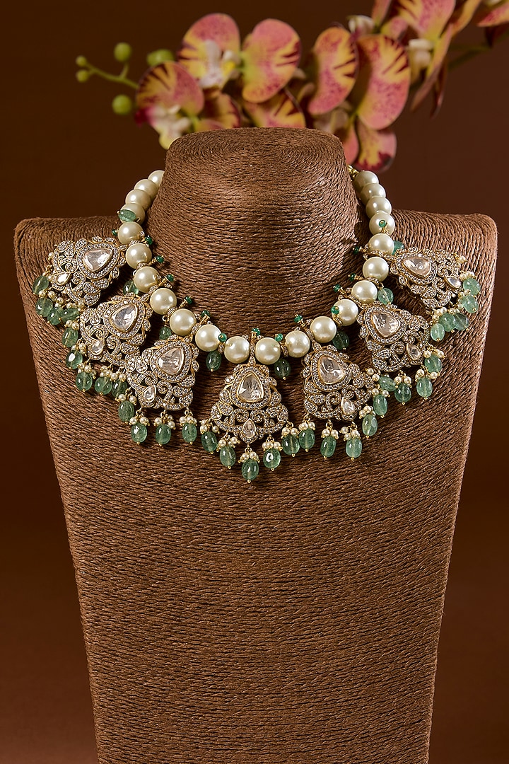 Gold Finish Kundan Polki & Emerald Stone Necklace Set In Sterling Silver by STELLA CREATIONS at Pernia's Pop Up Shop