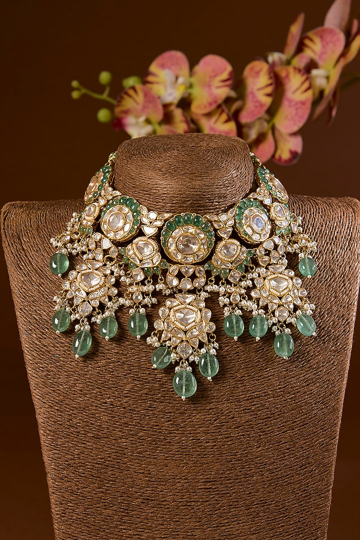 Gold Finish Kundan Polki & Emerald Stone Choker Necklace Set In Sterling Silver by STELLA CREATIONS at Pernia's Pop Up Shop