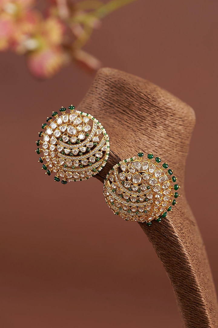 Gold Finish Moissanite Polki & Synthetic Emerald Stud Earrings In Sterling Silver by STELLA CREATIONS at Pernia's Pop Up Shop