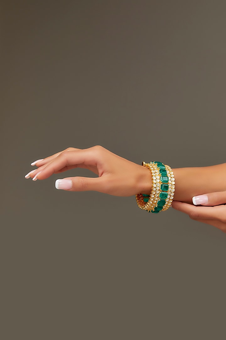 Gold Finish Moissanite Polki & Synthetic Emerald Bangle In Sterling Silver by STELLA CREATIONS at Pernia's Pop Up Shop