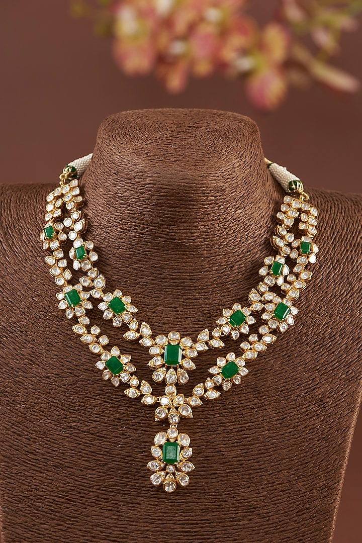 Gold Finish Moissanite Polki & Synthetic Emerald Necklace Set In Sterling Silver by STELLA CREATIONS at Pernia's Pop Up Shop