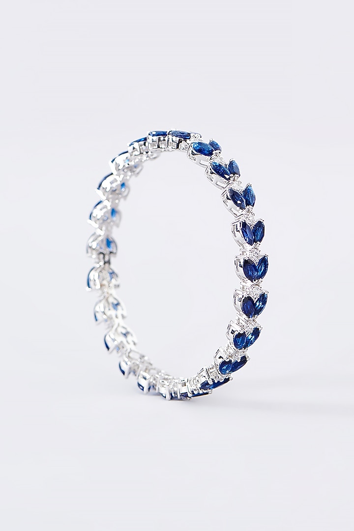 White Finish CZ & Sapphire Bangle In Sterling Silver by STELLA CREATIONS at Pernia's Pop Up Shop