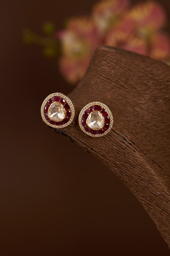 Gold Finish Moissanite Polki & Synthetic Ruby Stud Earrings In Sterling Silver by STELLA CREATIONS at Pernia's Pop Up Shop